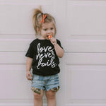 Love Never Fails Kids T-Shirt